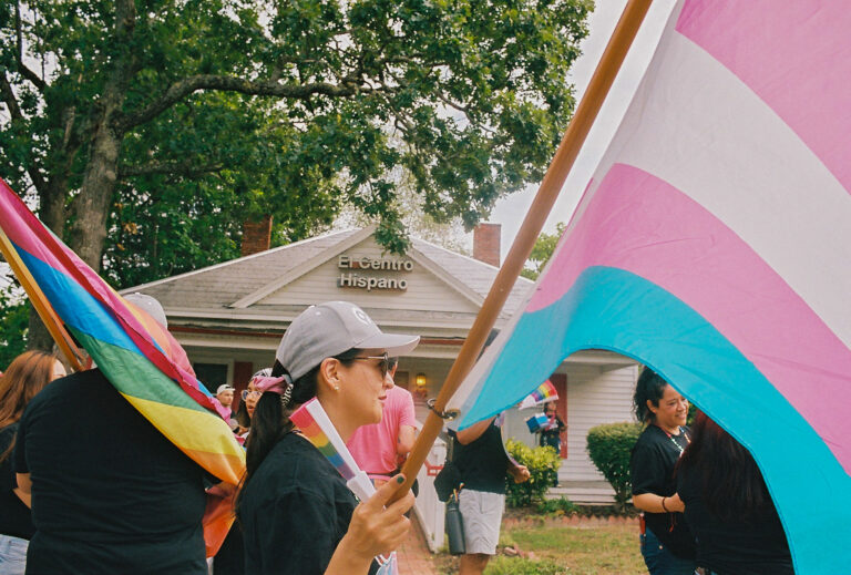 Local officials and community members gathered at El Centro Hispano for the 2026 Pride Piper walk in Carrboro, NC on June 26, 2026.