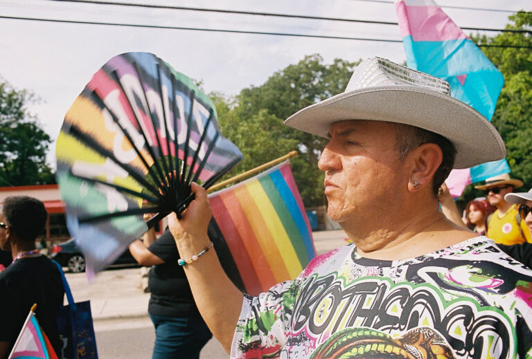 Local officials and community members gathered at El Centro Hispano for the 2026 Pride Piper walk in Carrboro, NC on June 26, 2026.